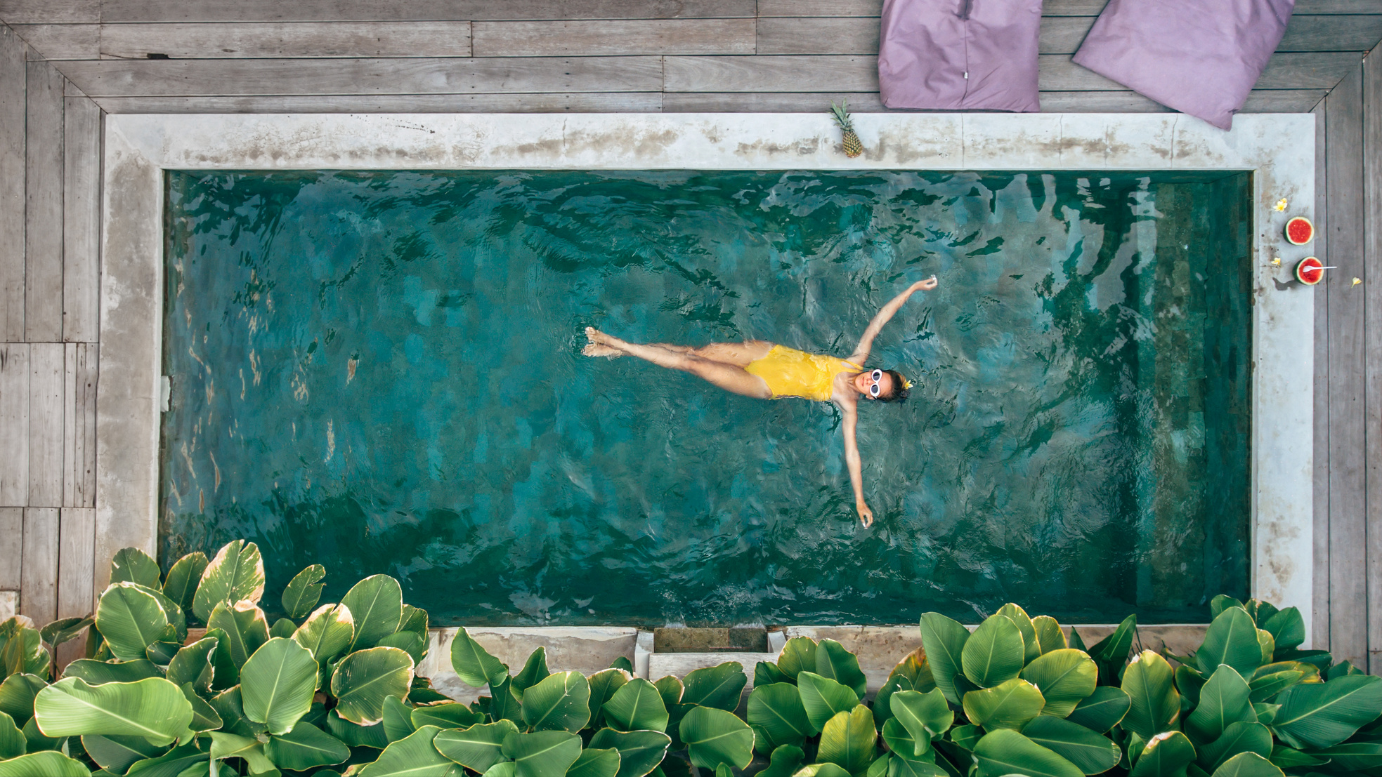 Girl Relaxing in Pool on Bali Villa